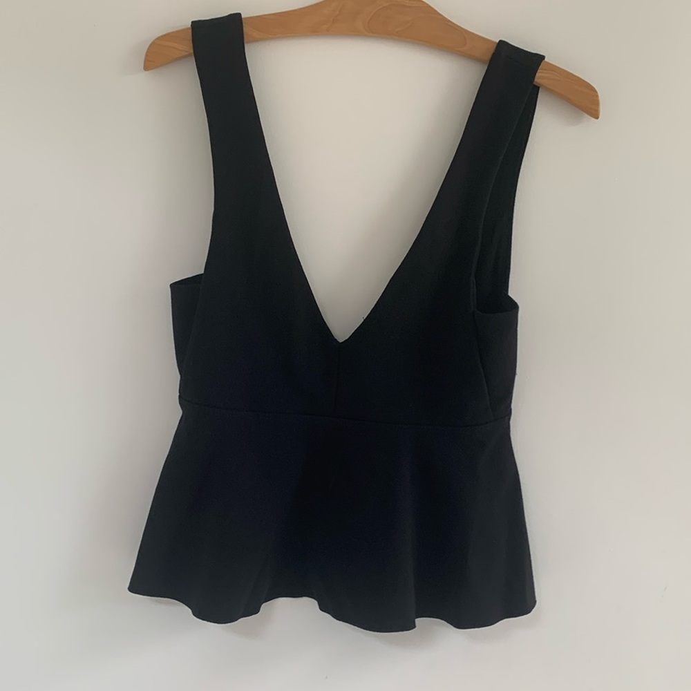 Black peplum top, size XS